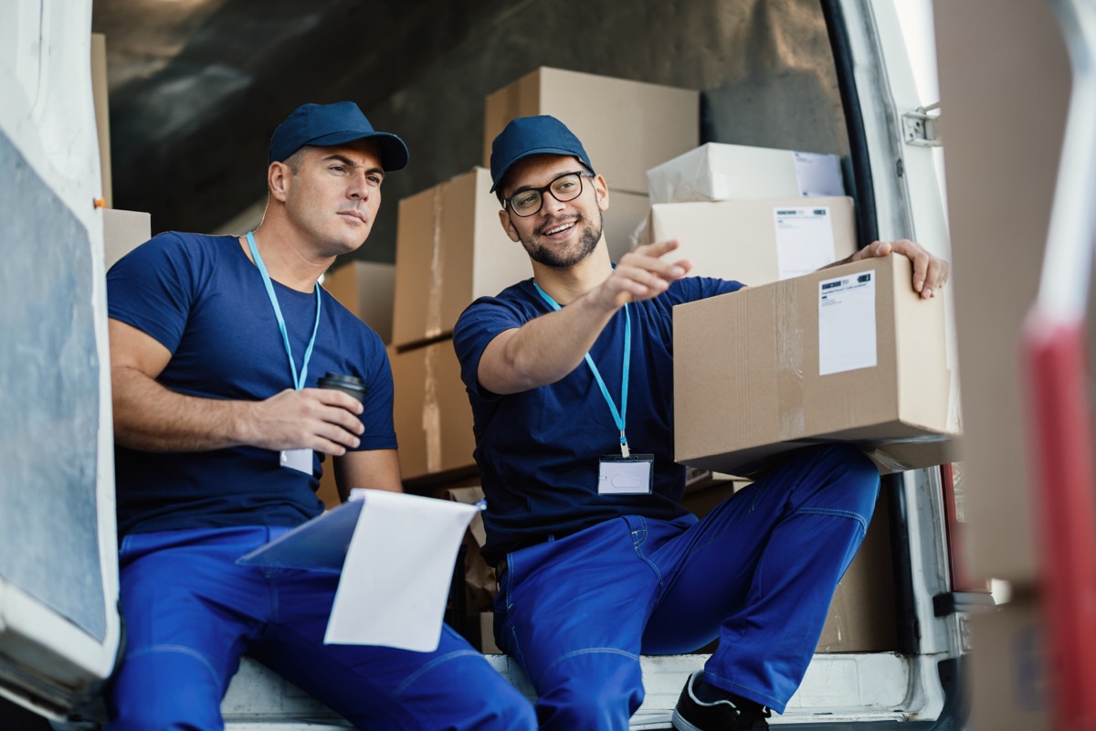 Our couriers unloading parcels from a delivery van